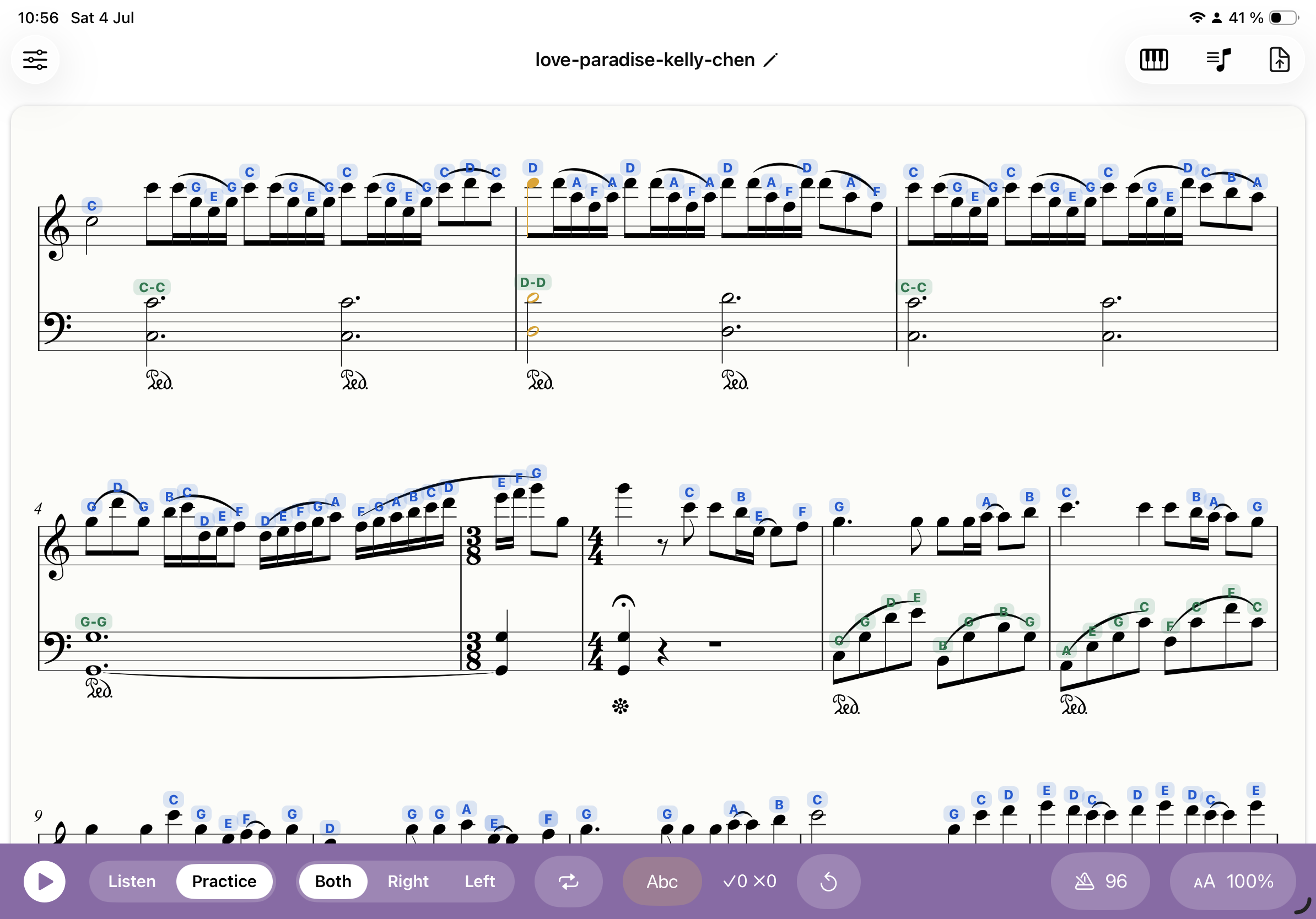 Sheet music with note-name letter labels above each note, colour-coded by hand